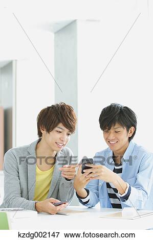Stock Photo - University student in the school cafe. Fotosearch