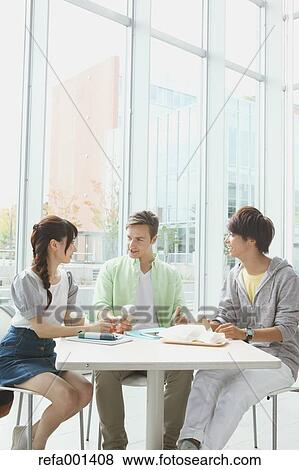 Stock Photo - University student in the school cafe. Fotosearch