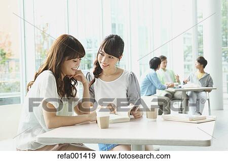 University student in the school cafe View Large Photo Image Stock Photo - University student in the school cafe. Fotosearch