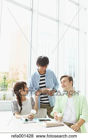 University student in the school cafe View Large Photo Image Stock Photo - University student in the school cafe. Fotosearch