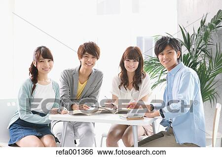 Stock Photograph - University student in the school cafe. Fotosearch