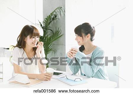 Stock Photograph - University student in the school cafe. Fotosearch