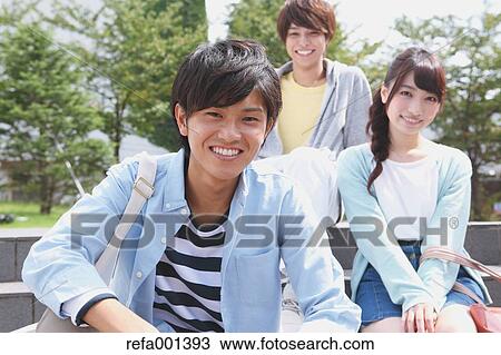 University students in the campus park View Large Photo Image Stock Image - University students in the campus park. Fotosearch