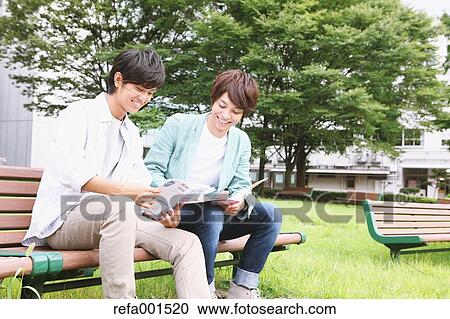 University students in the campus park View Large Photo Image Stock Image - University students in the campus park. Fotosearch