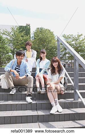 University students in the campus park View Large Photo Image Stock Photo - University students in the campus park. Fotosearch