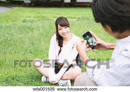 University students in the campus park View Large Photo Image Stock Photo - University students in the campus park. Fotosearch