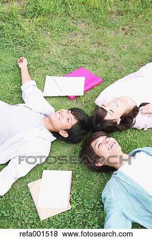 Stock Photo - University students in the campus park. Fotosearch