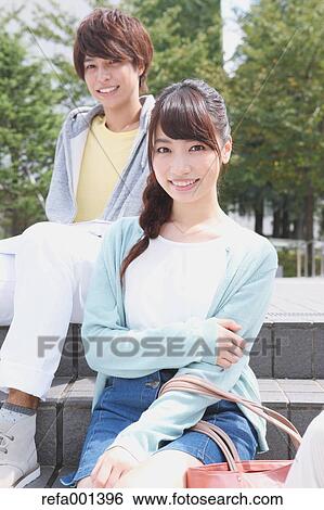 University students in the campus park View Large Photo Image Stock Photograph - University students in the campus park. Fotosearch