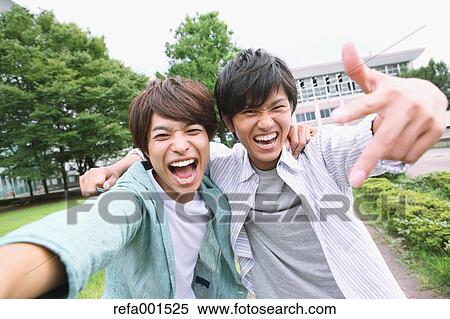University students in the campus park View Large Photo Image Stock Photography - University students in the campus park. Fotosearch