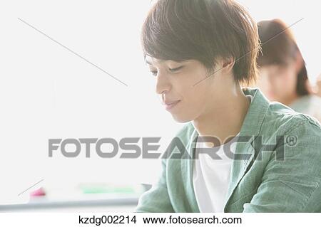 Picture - University students in the classroom. Fotosearch