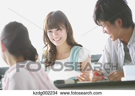Picture - University students in the classroom. Fotosearch