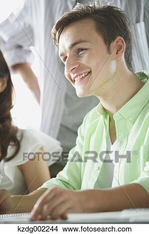 Picture - University students in the classroom. Fotosearch