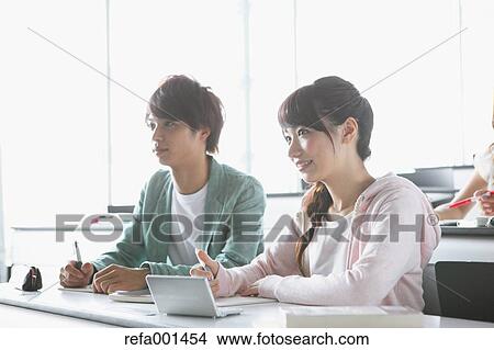Picture - University students in the classroom. Fotosearch