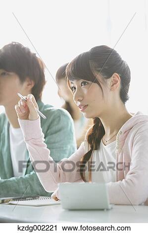 Stock Image - University students in the classroom. Fotosearch