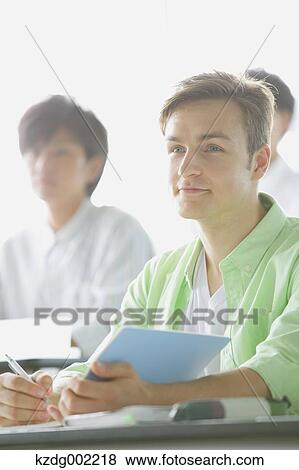 Stock Photo - University students in the classroom. Fotosearch