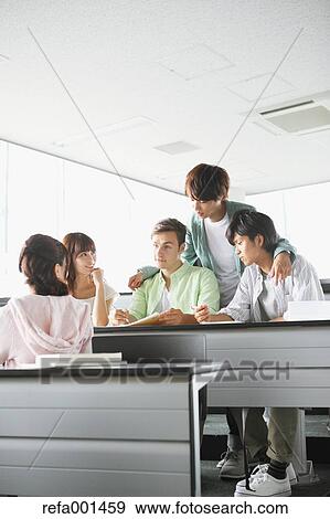 University students in the classroom View Large Photo Image Stock Photo - University students in the classroom. Fotosearch
