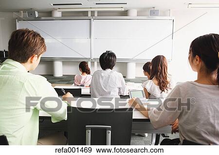 Stock Photo - University students in the classroom. Fotosearch