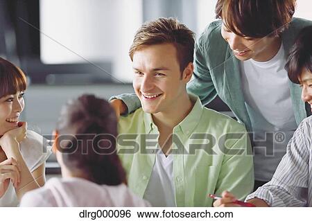 Stock Photograph - University students in the classroom. Fotosearch