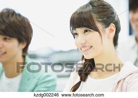Stock Photograph - University students in the classroom. Fotosearch