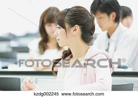 Stock Photography - University students in the classroom. Fotosearch