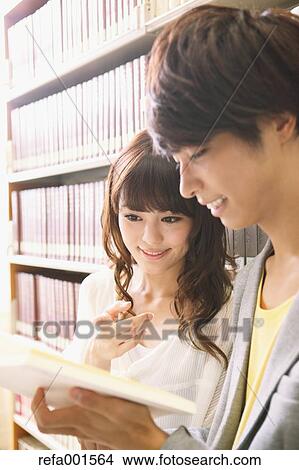 University students in the library View Large Photo Image Picture - University students in the library. Fotosearch