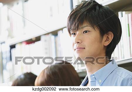 University students in the library View Large Photo Image Stock Image - University students in the library. Fotosearch
