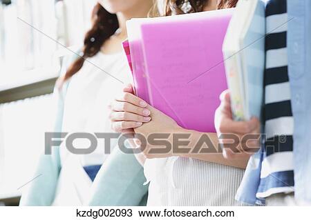 University students in the library View Large Photo Image Stock Image - University students in the library. Fotosearch