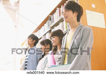 University students in the library View Large Photo Image Stock Image - University students in the library. Fotosearch