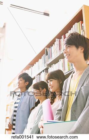 University students in the library View Large Photo Image Stock Image - University students in the library. Fotosearch