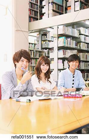 University students in the library View Large Photo Image Stock Image - University students in the library. Fotosearch