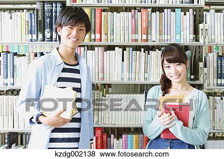 University students in the library View Large Photo Image Stock Photo - University students in the library. Fotosearch