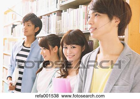 University students in the library View Large Photo Image Stock Photo - University students in the library. Fotosearch