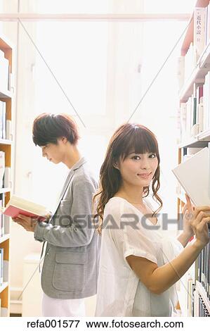 University students in the library View Large Photo Image Stock Photo - University students in the library. Fotosearch
