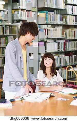 University students in the library View Large Photo Image Stock Photograph - University students in the library. Fotosearch