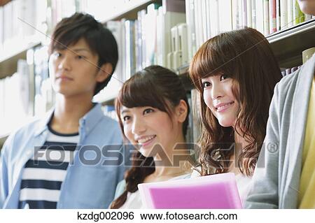 University students in the library View Large Photo Image Stock Photograph - University students in the library. Fotosearch