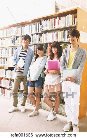 University students in the library View Large Photo Image Stock Photograph - University students in the library. Fotosearch