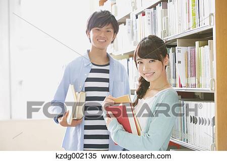 University students in the library View Large Photo Image Stock Photography - University students in the library. Fotosearch