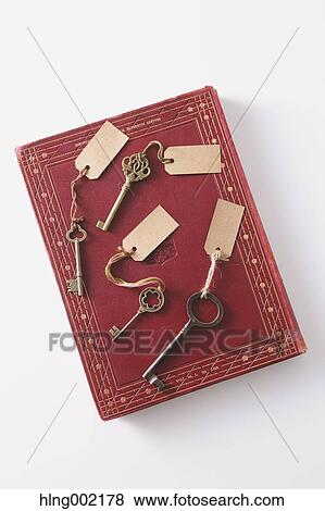 Vintage keys and book View Large Photo Image Stock Photo - Vintage keys and book. Fotosearch