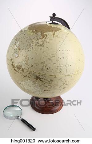 World globe and magnifying glass View Large Photo Image Stock Image - World globe and magnifying glass. Fotosearch