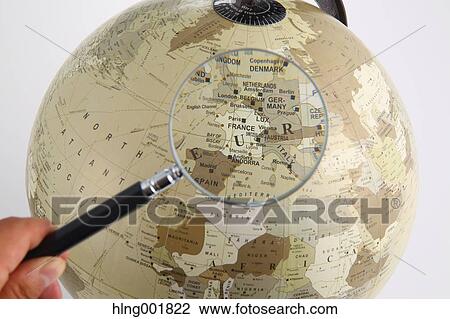 World globe and magnifying glass View Large Photo Image Stock Image - World globe and magnifying glass. Fotosearch