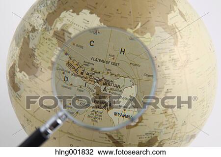 World globe and magnifying glass View Large Photo Image Stock Image - World globe and magnifying glass. Fotosearch