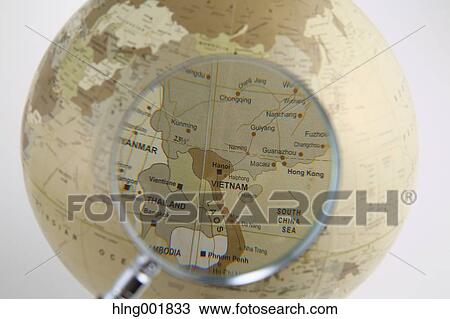 World globe and magnifying glass View Large Photo Image Stock Image - World globe and magnifying glass. Fotosearch