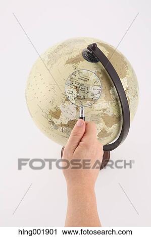 World globe and magnifying glass View Large Photo Image Stock Image - World globe and magnifying glass. Fotosearch