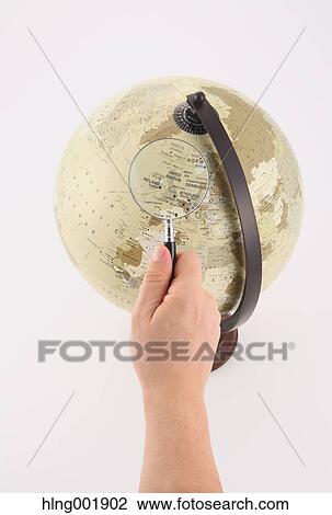 World globe and magnifying glass View Large Photo Image Stock Image - World globe and magnifying glass. Fotosearch