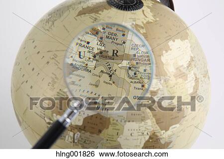 World globe and magnifying glass View Large Photo Image Stock Photograph - World globe and magnifying glass. Fotosearch