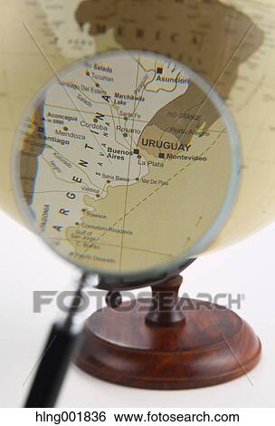 World globe and magnifying glass View Large Photo Image Stock Photograph - World globe and magnifying glass. Fotosearch
