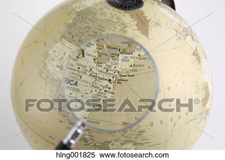 World globe and magnifying glass View Large Photo Image Stock Photography - World globe and magnifying glass. Fotosearch
