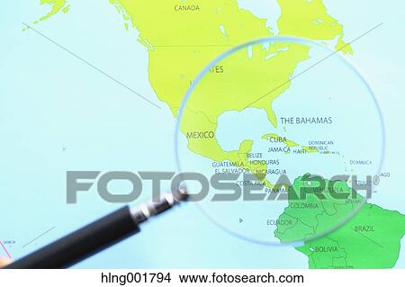 World map and magnifying glass View Large Photo Image Picture - World map and magnifying glass. Fotosearch
