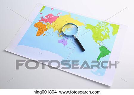 World map and magnifying glass View Large Photo Image Picture - World map and magnifying glass. Fotosearch