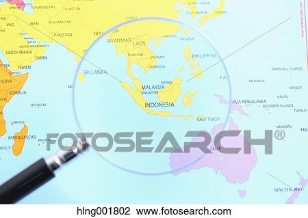 World map and magnifying glass View Large Photo Image Stock Image - World map and magnifying glass. Fotosearch